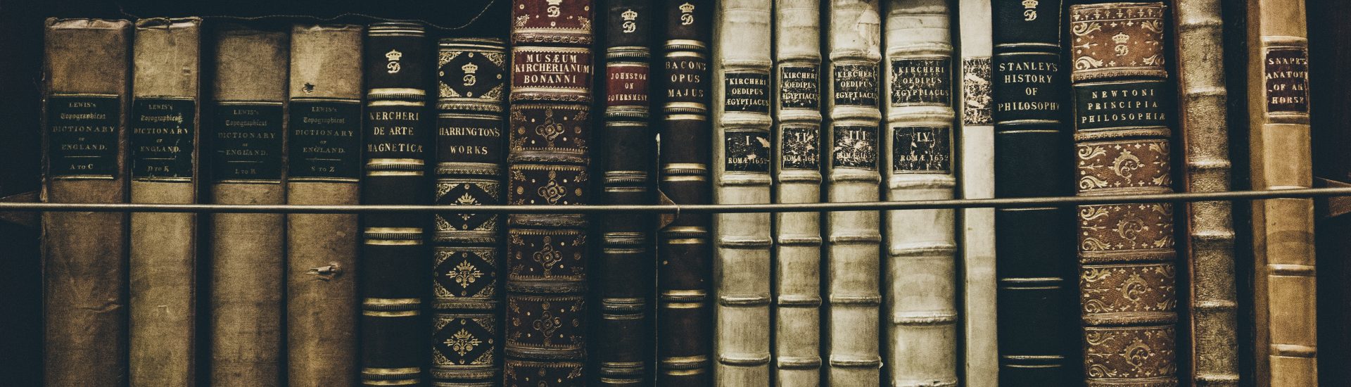 Photo of old books by Thomas Kelley on Unsplash